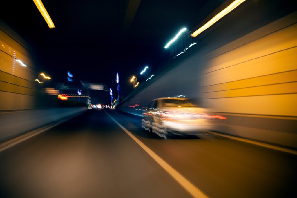 Rhode Island DUI Laws | Blurred image of car in tunnel | Experienced DUI Attorney | Stefanie A. Murphy